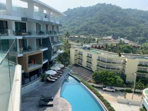 a view of a hotel with a swimming pool at Absolute Twin Sands by Lofty in Patong Beach
