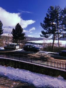a car parked on a road in the snow at delizioso appartamento panoramico con giardino privato in Rivisondoli