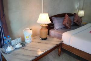 Cama o camas de una habitación en Coral Resort
