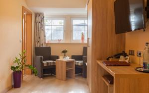 Kuchyň nebo kuchyňský kout v ubytování Hotel Grasberger Hof GmbH