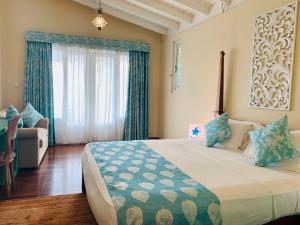 Postel nebo postele na pokoji v ubytování Thaproban Beach House + 36 fotografií
