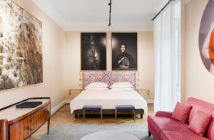 Postel nebo postele na pokoji v ubytování Galleria Vik Milano - Townhouse Galleria - Small Luxury Hotels of the World