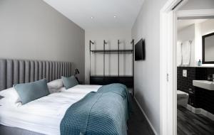 Postel nebo postele na pokoji v ubytování Reykjavik Residence Apartment Hotel