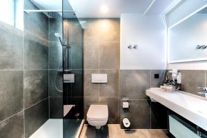 Koupelna v ubytování Offenbach Plaza Hotel