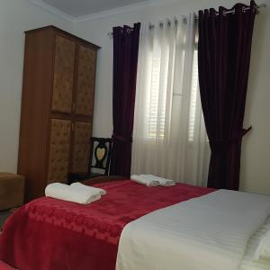 Postel nebo postele na pokoji v ubytování Hotel Erandi