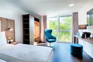 ACHAT Hotel Stuttgart Zuffenhausen 객실 침대