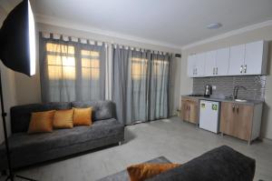 Kuchyň nebo kuchyňský kout v ubytování SELERDOĞA EVLERİ