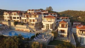 an aerial view of a house with a swimming pool at Villa Elia in Pteleos