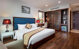 Voodi või voodid majutusasutuse Skylark Hotel toas