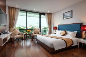 Voodi või voodid majutusasutuse Skylark Hotel toas