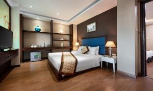 Voodi või voodid majutusasutuse Skylark Hotel toas