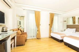 TV a/nebo společenská místnost v ubytování City Hall Hotel Sultanahmet