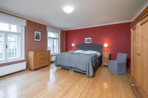 Posteľ alebo postele v izbe v ubytovaní Liliova Apartments