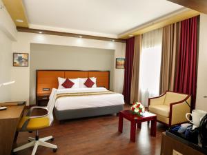 Dimora Hotels And Resorts客房内的一张或多张床位
