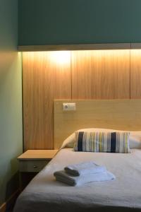 Postel nebo postele na pokoji v ubytování Alba Hotel