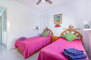 A bed or beds in a room at 053 La Mata Dunes - Alicante Real Estate