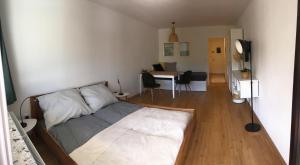 A bed or beds in a room at Appartement Hochkönigreich