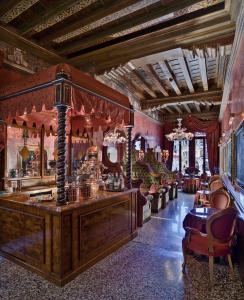 a large room with a bar in a building at Al Ponte Antico in Venice