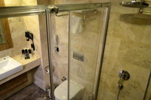 Koupelna v ubytování Extenso Hotel