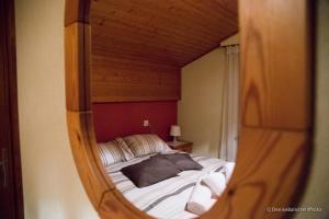 Postel nebo postele na pokoji v ubytování Relais Fleuri