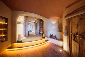 Ein Bett oder Betten in einem Zimmer der Unterkunft Boutiquehotel Blaue Burg Falkenstein