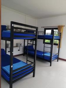 Postel nebo postele na pokoji v ubytování Sea Breeze Backpacker