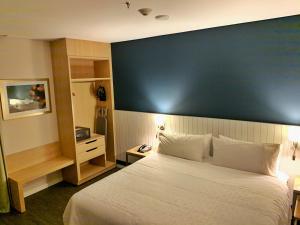 Voodi või voodid majutusasutuse Holiday Inn Express Asuncion Aviadores by IHG toas