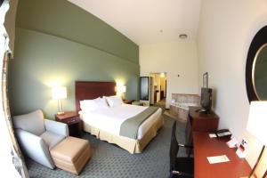 Postel nebo postele na pokoji v ubytování Holiday Inn Express & Suites Cocoa by IHG