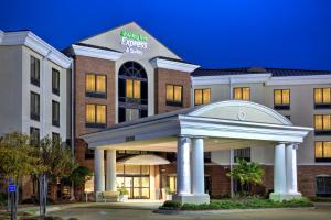 eine Darstellung der Fassade eines Hotels in der Unterkunft Holiday Inn Express Hotel & Suites Jackson - Flowood, an IHG Hotel in Flowood