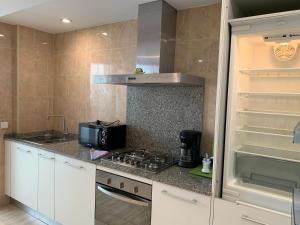 Kuchyňa alebo kuchynka v ubytovaní Edificio C'an Patilla