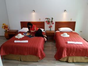 Postel nebo postele na pokoji v ubytování Hostal España