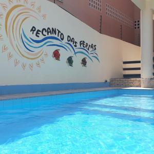 Pousada Recanto das Férias tesisinde veya buraya yakın yüzme havuzu