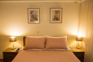 Giường trong phòng chung tại Ivannas dream house