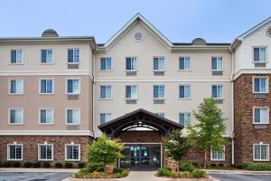 a rendering of the front of a hotel at Staybridge Suites Columbus - Fort Moore, an IHG Hotel in Columbus