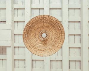 a wicker basket hanging from a ceiling at South Hostel Cádiz - Service Center in Cádiz