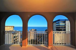 a view of the ocean from a balcony at Apartamento Olimpo Orange Costa in Benicàssim