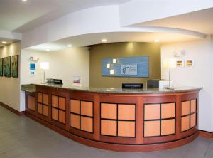a lobby of a hospital with a reception counter at Holiday Inn Express & Suites Danville, an IHG Hotel in Danville