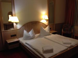 מיטה או מיטות בחדר ב-Hotel "Zur Panke"