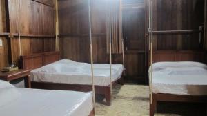 Postel nebo postele na pokoji v ubytování Homestay Xóm Dừa Nước