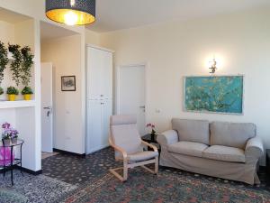 Zona d'estar a San Lucifero Home & Relax - IUN 1871