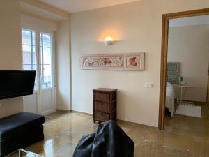 TV a/nebo společenská místnost v ubytování Apartamento Calle Nueva