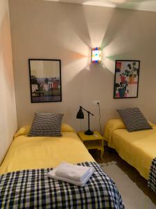 Postel nebo postele na pokoji v ubytování Apartamento Calle Nueva