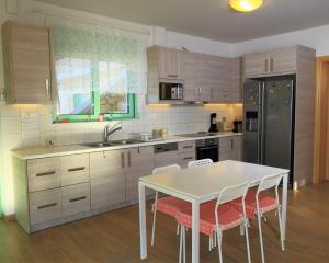A kitchen or kitchenette at Meganisi Blue Villa