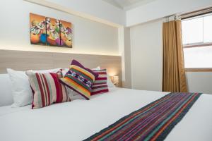 Cama ou camas em um quarto em Casa Matara Boutique