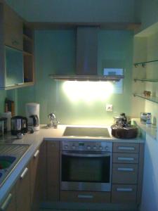 
A kitchen or kitchenette at Chrysis Apartments
