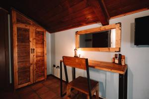 Un televizor și/sau centru de divertisment la Agriturismo la Bicocca
