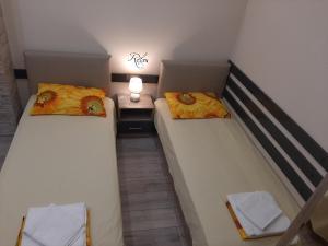 Postel nebo postele na pokoji v ubytování Apartment RELAX
