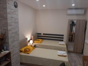 Postel nebo postele na pokoji v ubytování Apartment RELAX