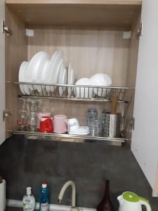 Kuchyň nebo kuchyňský kout v ubytování Apartment RELAX