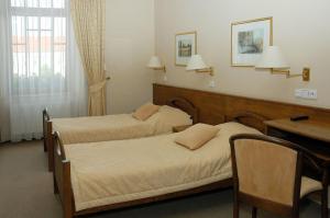 Posteľ alebo postele v izbe v ubytovaní Hotel Restaurant Modrá Hvězda